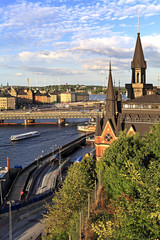 Stockholm, Sweden - Old town quarter Gamla Stan with city hall and Centralbron bridge - obrazy, fototapety, plakaty