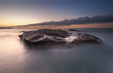 beautiful view of sunset seascape at Kudat, SAbah Malaysia. image may contain soft focus and blur due to long expose.