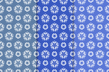 Set of floral ornaments. Vertical blue seamless patterns