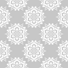 White flowers on gray background. Ornamental seamless pattern