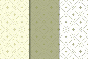 Olive green and white geometric ornaments. Set of seamless patterns