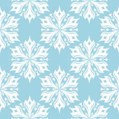 White floral seamless pattern on blue background