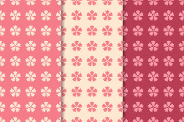 Set of red floral ornaments. Cherry pink vertical seamless patterns