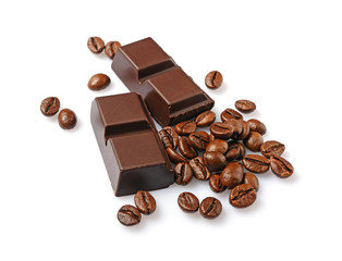 Close-up pieces of dark chocolate bar with coffee flavor and beans