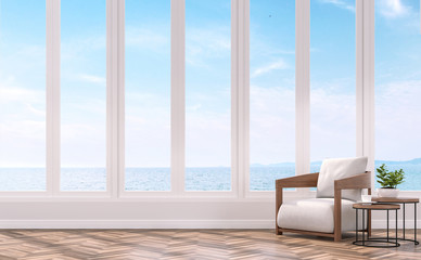 Modern living with sea view 3d rendering image.The Rooms have wooden floors .furnished with wood and fabric furniture.There are white window overlooks to sea view.