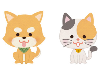 おすわりするペットの犬と猫