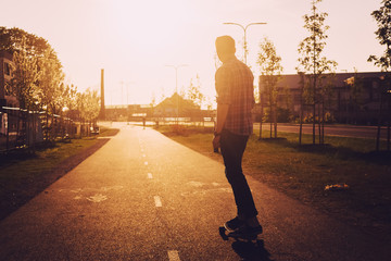 Longboarding into sunset - golden hour