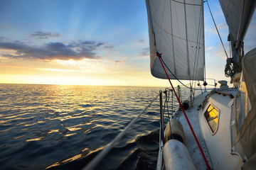 View from the deck of a yacht sailing in calm baltic sea at th evening