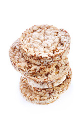 Diet rice cakes pile isolated on white background