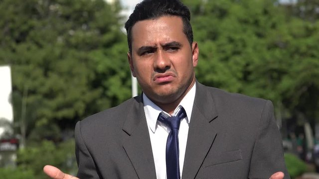 Hispanic Business Man And Confusion