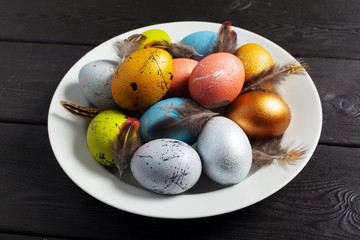 Happy easter! Easter eggs on wooden background