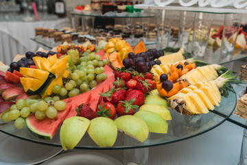 apricots plums pineapple and kiwi