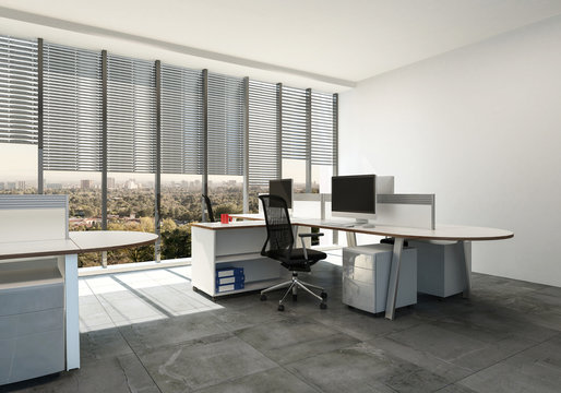 Modern open plan office with large windows
