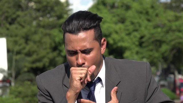 Hispanic Business Man Coughing