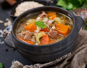 Thick soup with beef, pearl barley, pumpkin and celery. Dietary menu.