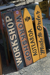 Matakana farmersmarket New Zealand. Signs for sale. Workshop.  © A
