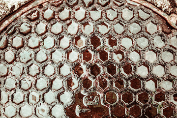 Manhole cover. Abstract background. Toned.