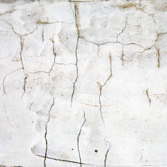 Old cracked white wall