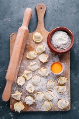 Fresh raw homemade tortellini or ravioli pasta