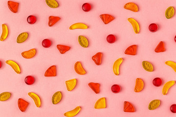 Colorful candies pattern on a bright background.