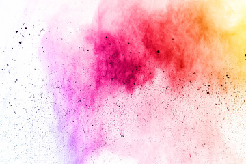 Explosion of colored powder on white background.