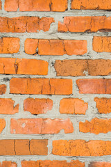 Old brick wall with cracks. Wall of red brick.