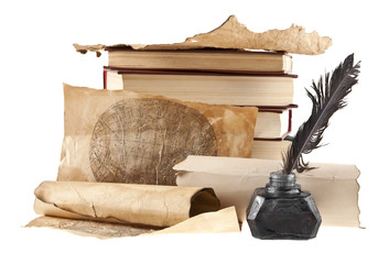 old paper and inkwell with pen isolated on white background closeup
