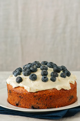Freshly baked cheesy spinach bread on a white stone backdrop. Rustic style.