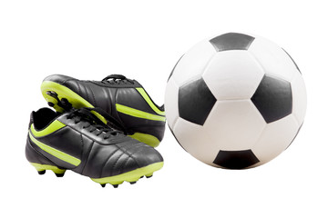 Close up photo of a soccer shoes and ball