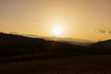 Naklejka na ściany i meble sunset over the Apuseni Mountains in Romania