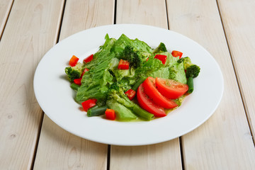 Fresh spring green salad, beans, tomato and broccoli