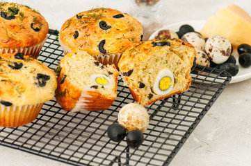 Freshly baked cheesy spinach bread on a white stone backdrop. Rustic style.