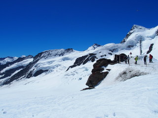 Fototapeta na wymiar Snow covered Swiss Alps on Jungfraujoch