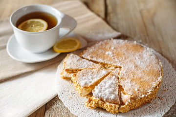 Tasty italian cake with a cup of tea