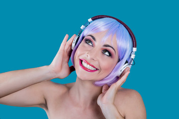 Fototapeta premium Cheerful glamour woman in headphones