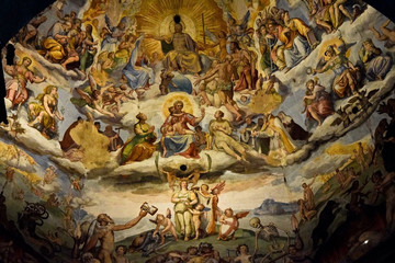 FLORENCE, ITALY - SEPTEMBER 18, 2017:  Detail of the Last Judgment; a monumental fresco painted by Giorgio Vasari and Federico Zuccari in 16th century in the Dome of Florence Cathedral