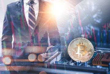 The double exposure image of the business man using a smartphone overlay with bitcoin and binary code image. the concept of cryptocurrency, blockchain, internet of things and future life