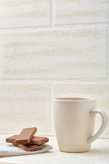 Cup of coffee and waffles isolated on the white background,
