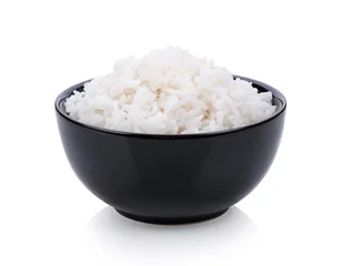 Fototapeten rice in black bowl on white background © sommai