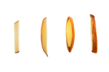 Isolate sliced almond seed, bar shape sliced almond seeds, a close up photo image of four pieces of sliced almond seeds in bar shape isolate on bright white light background