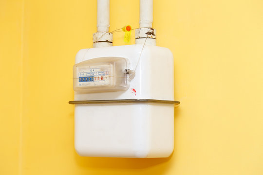 Gas meter on the wall in the kitchen.