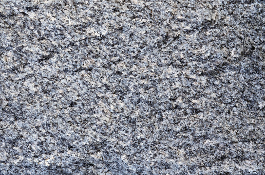 Nature texture of granite-gneiss rock a gneiss metamorphic rock that transformation from granite igneous rock and still has a granite texture, can use for a background