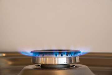 Gas flame coming from a gas cooker that provides the heating to the house