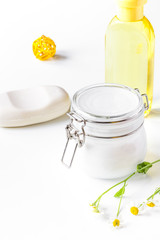 natural organic cosmetics with herbs for baby on white backgroun