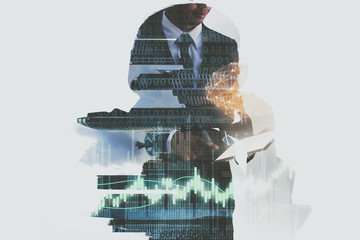 Double exposure of a businessman working.