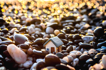 Toy house on the beach