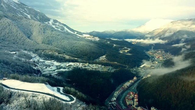 top down view if the mountain valley above the clouds.