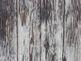 Weathered white gray brown wooden background.