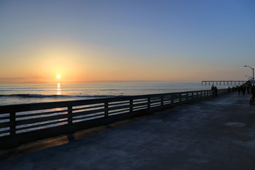 The sunset over the Ocean Beach Pier near San Diego, California.