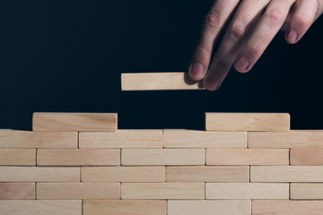 Construction concept Wooden puzzles